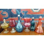 Six pieces of coloured decoratively glassware: to include an 'oversized' pedestal wine LSB