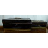 Two similar early 20thC black painted and gilded cash tins with folding,