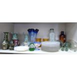 Decorative glassware: to include a pair of bulbous bottle vases with frilled rims and streaky,