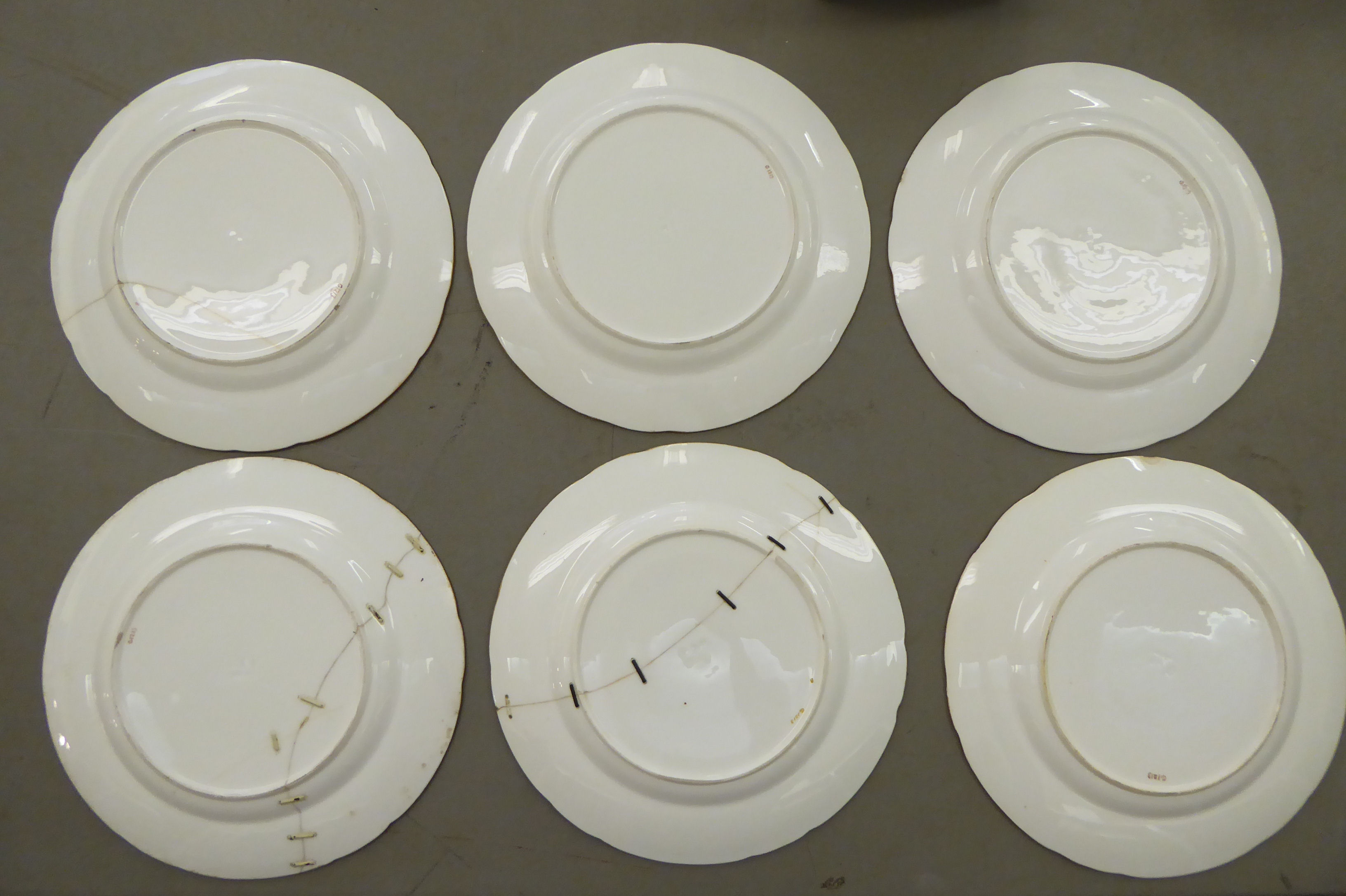 An early 20thC Minton porcelain dessert service, decorated with landscapes, cartouches, - Image 7 of 7