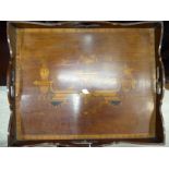 An Edwardian mahogany four handled serving tray,