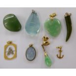 Small items of personal ornament: to include jade and gold coloured metal pendants 11