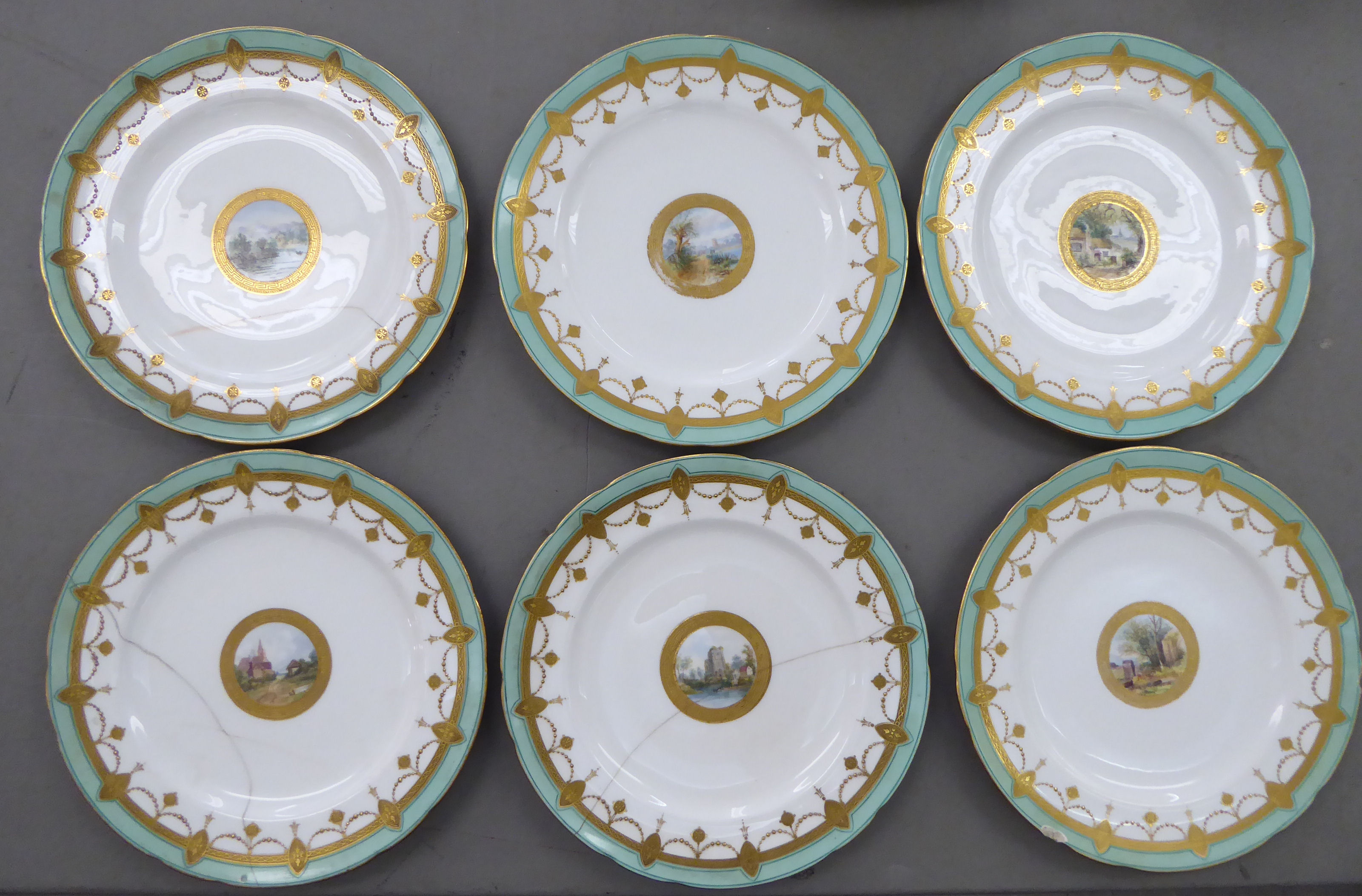 An early 20thC Minton porcelain dessert service, decorated with landscapes, cartouches, - Image 4 of 7