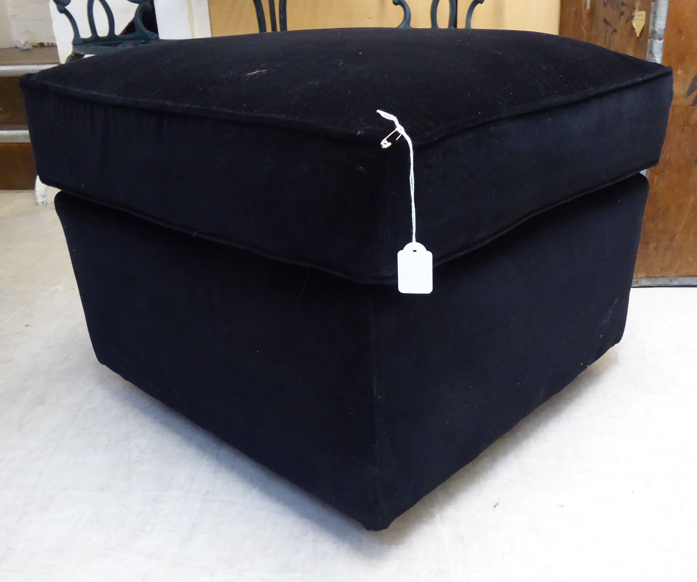 A Greengate black velvet upholstered pouffe,