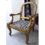 A Ralph Lauren 'Duke' gilt sprayed showwood open arm chair frame,