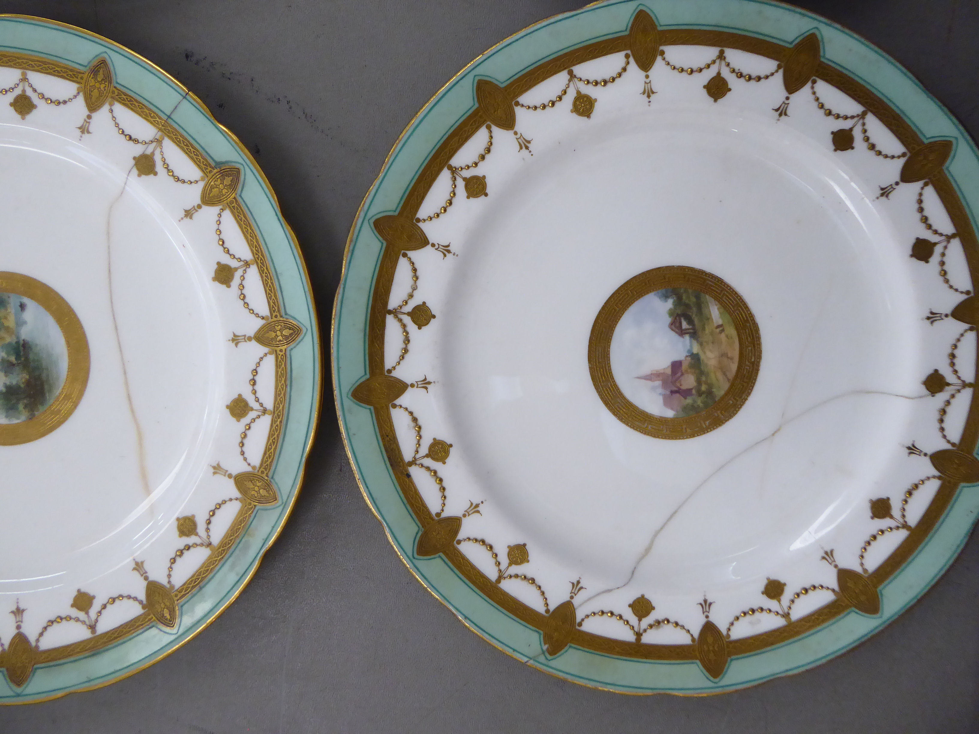 An early 20thC Minton porcelain dessert service, decorated with landscapes, cartouches, - Image 5 of 7