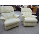 A pair of La-Z-Boy cushioned stitched cream coloured soft hide upholstered recliner armchairs