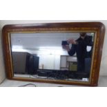 A late Victorian overmantel mirror,