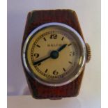 A lady's 'vintage' Ralco Swiss made stainless steel cased and maroon hide covered brooch watch,