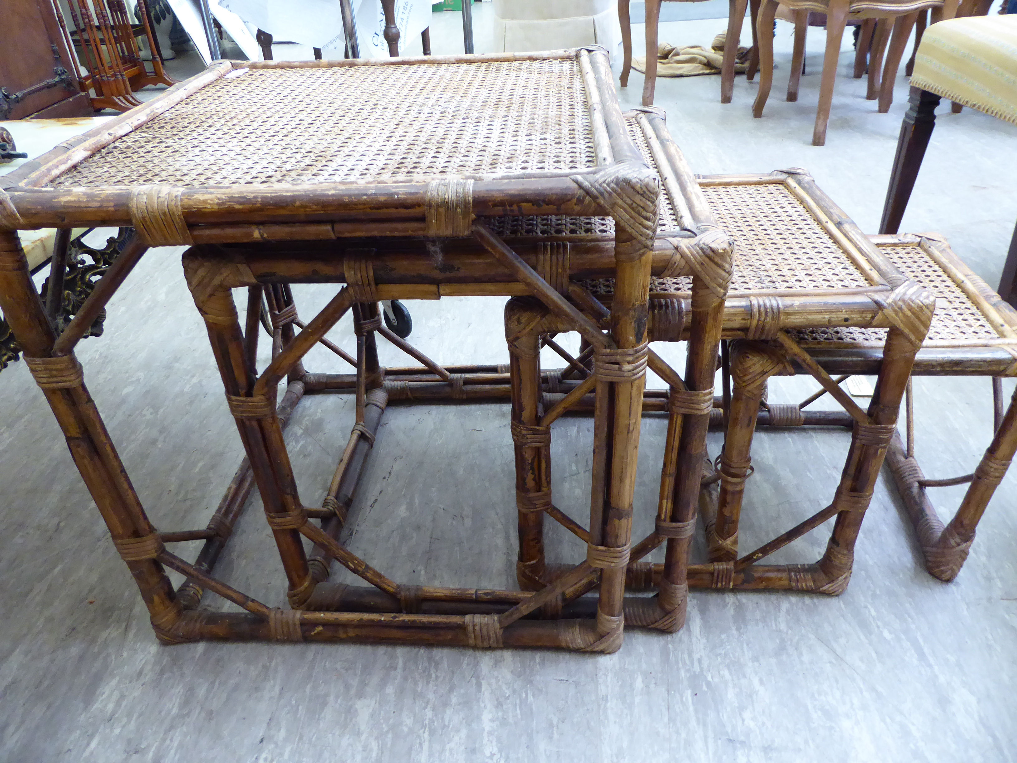 A quartetto of 20thC cane and bamboo bound occasional tables largest 20''h 20''sq RAM