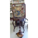 A William IV mahogany polescreen with a height adjustable tapestry panel,