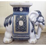 A modern blue and white glazed china elephant stool with a platform top 17''h LSB