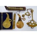 Various small 19th and early 20thC weighing instruments: to include two similar brass examples with