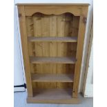 A modern pine openfront three tier bookcase,