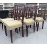 A set of six 1920s mahogany framed dining chairs, each with a splat back, raised on square,