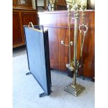 A set of three Victorian design brass fireside companions comprising a shovel,