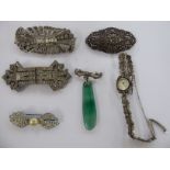 Costume jewellery: to include a white metal,