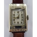 A lady's Elgin white metal cased wristwatch with a silver coloured Arabic dial,
