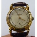 A Longines 14ct gold cased wristwatch with a white baton dial,