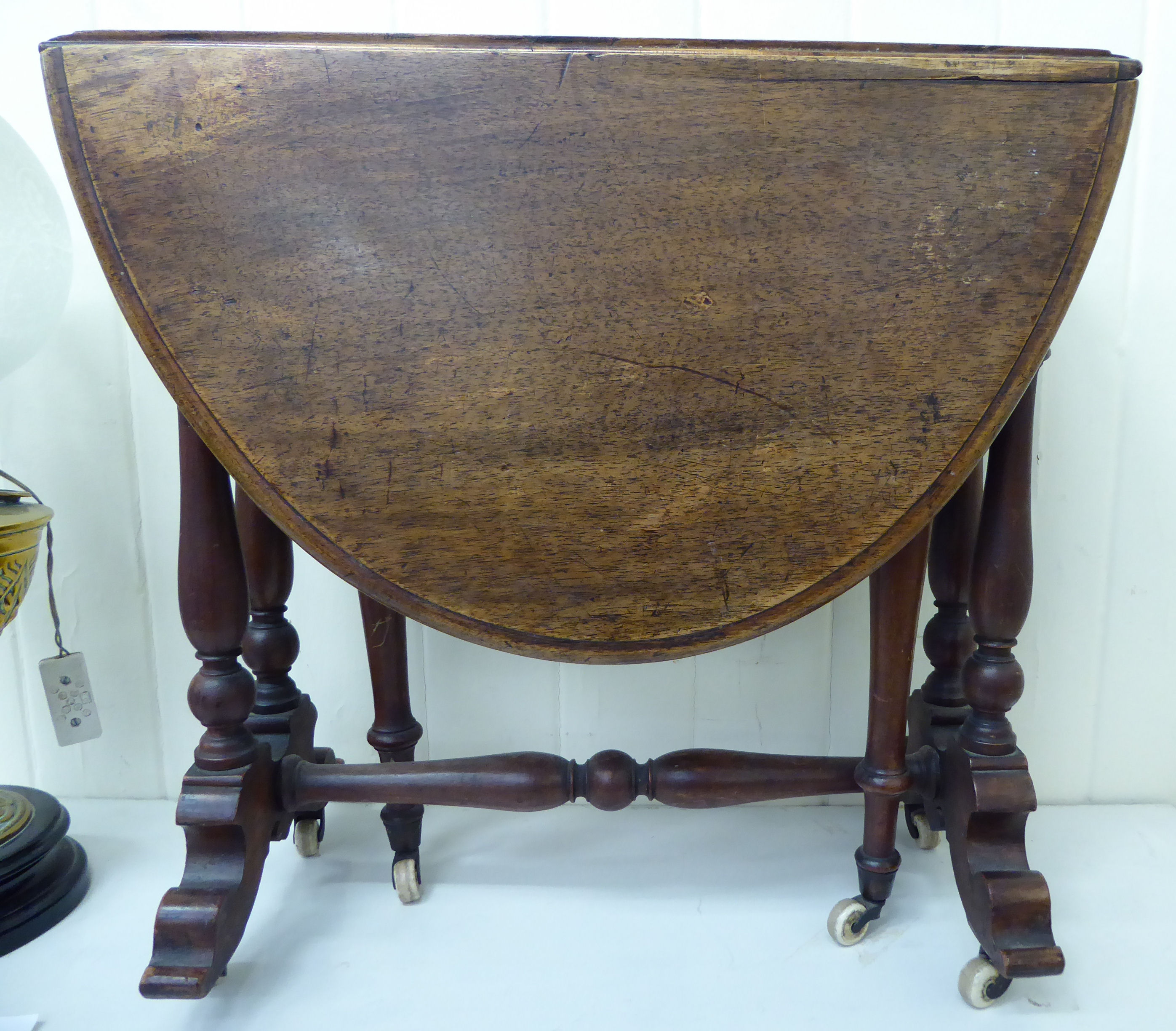 A late Victorian mahogany Sutherland table,