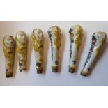 A set of six late 19th/early 20thC South European porcelain pistol grip cutlery handles,