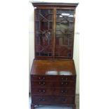 A late Georgian mahogany bureau bookcase,