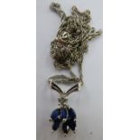 A 14ct white gold diamond and sapphire pendant necklace 11