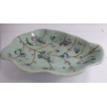 A late 19th/early 20thC Chinese porcelain leaf shaped footed dish,