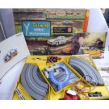 A Tri-ang Minic Motorways model racing car set, comprising two cars,