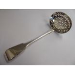 A mid Victorian silver fiddle pattern sifter spoon, the shallow,