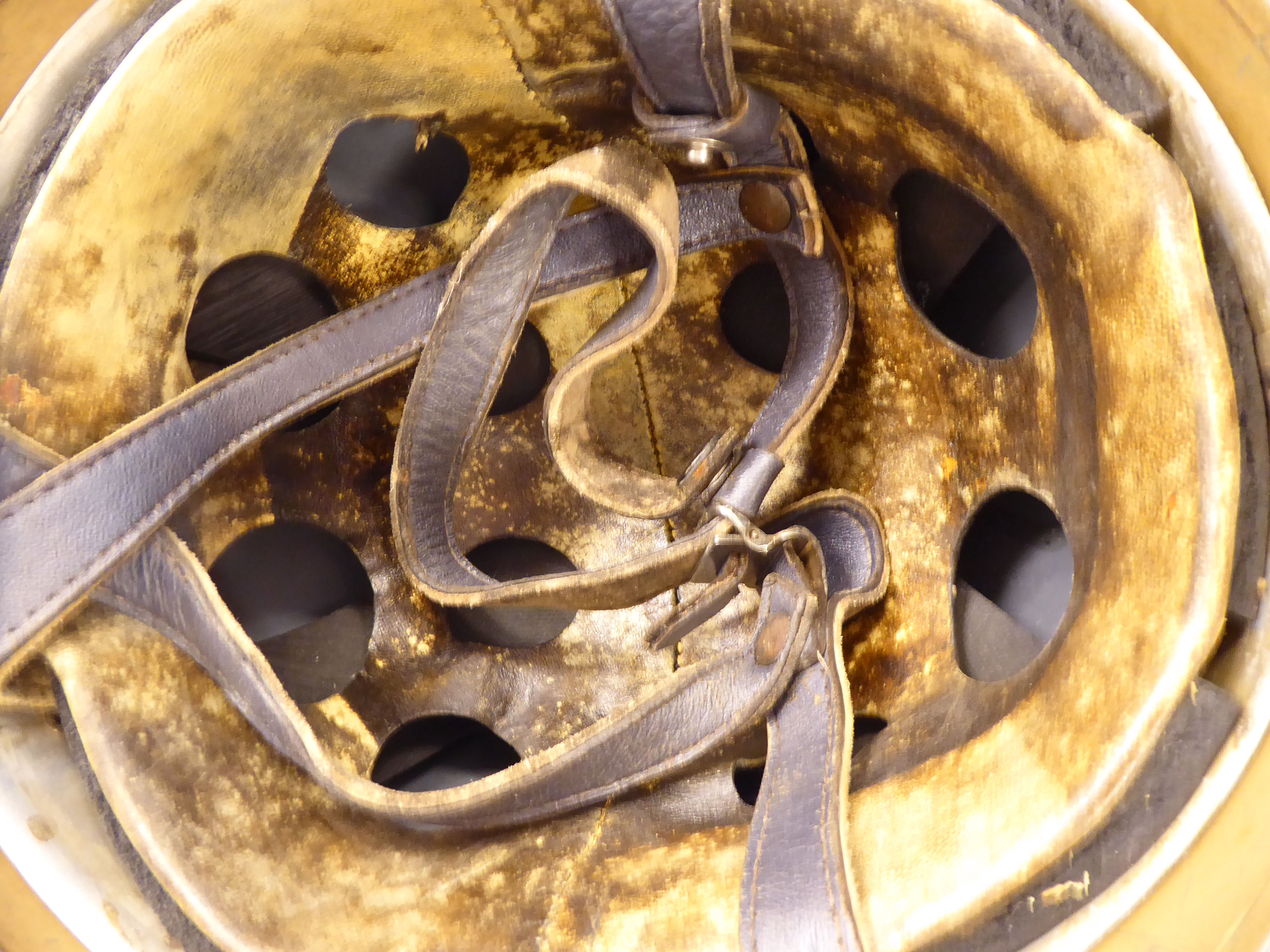 A German brown painted parachutist's helmet with a hide lining and chinstrap (Please Note: this - Image 6 of 8