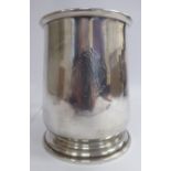 An early 20thC Georgian style silver one pint mug of tapered,