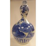 An early 18thC Japanese porcelain double-gourd shaped vase,