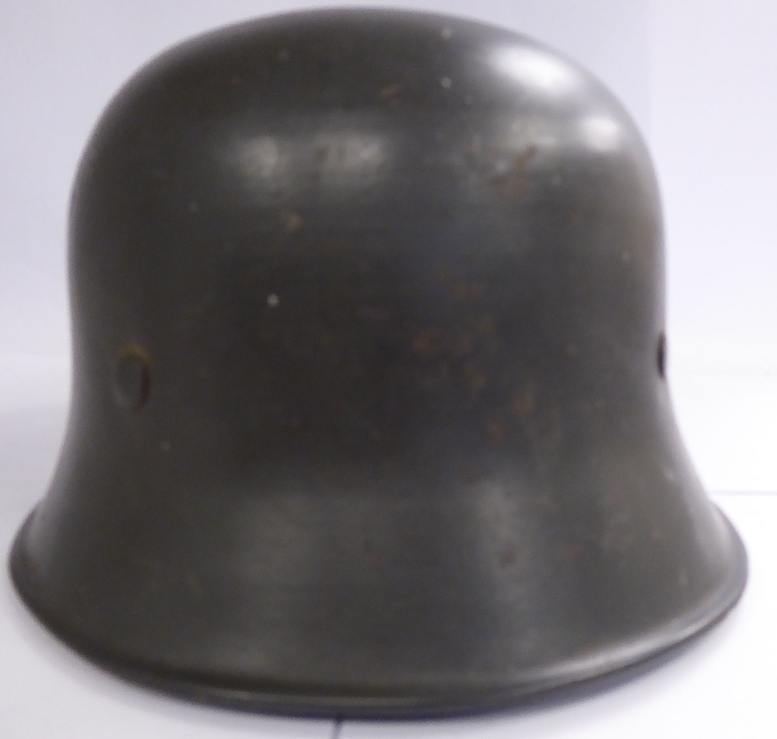 A German green painted SS helmet with a hide lining and decals (Please Note: this lot is offered - Image 4 of 8