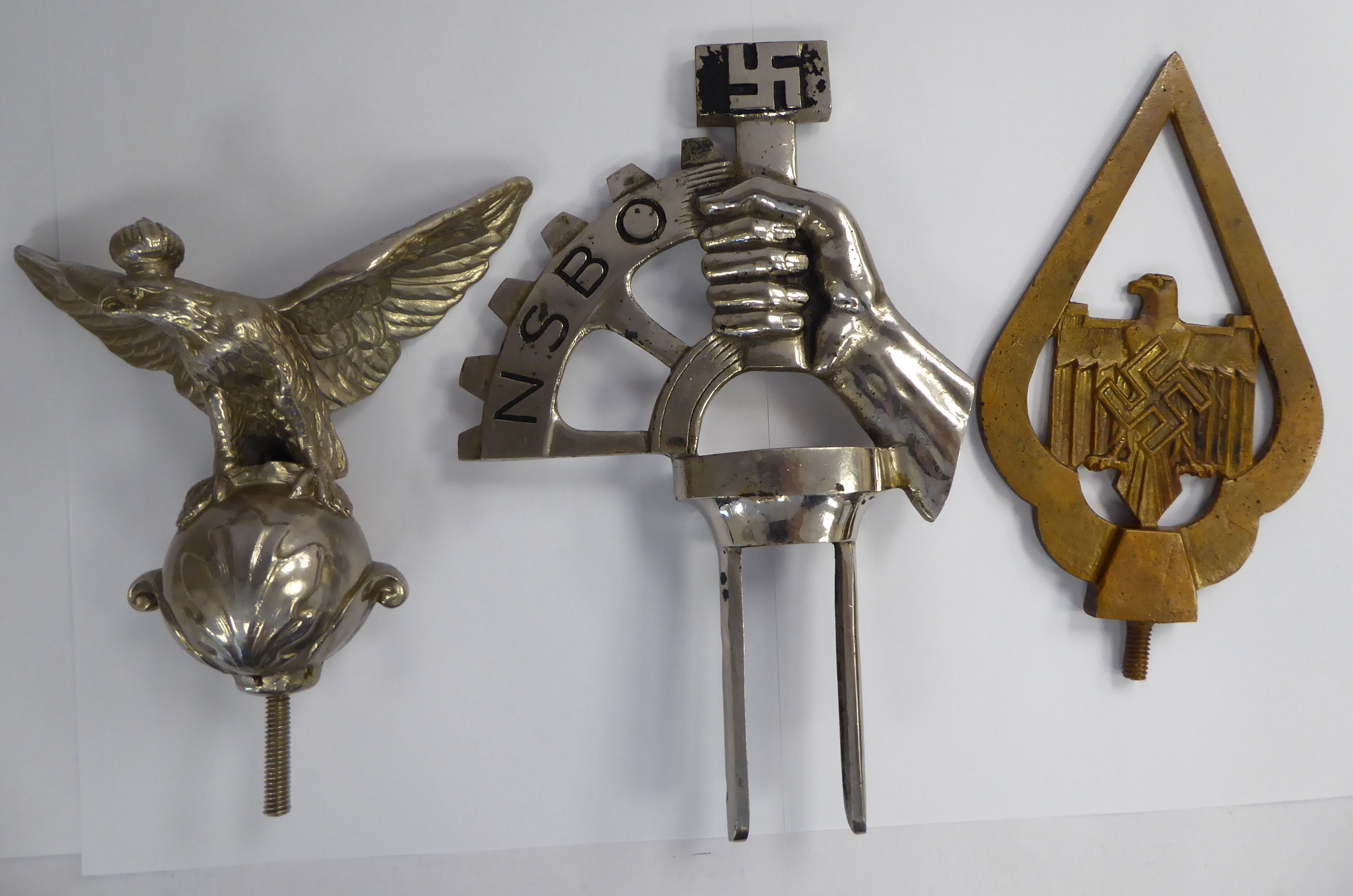 A German NSBO chromium plated steel flag finial, featuring a swastika,