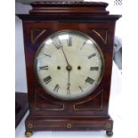 A William IV lacquered brass inlaid mahogany cased bracket clock, having a radiating,
