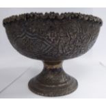 A Persian silver coloured metal bowl, elevated on a waisted pedestal foot,