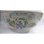 A late 18thC Chinese porcelain footed bowl, decorated in European taste in reserves with figures,