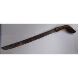 An 'antique' Japanese short sword with a carved horn handle,