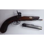 A 19thC percussion action pistol with decoratively engraved plates,