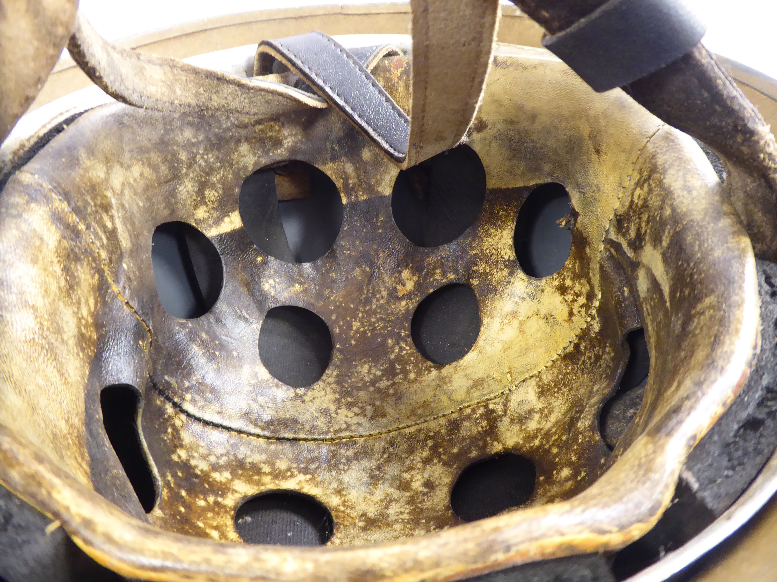 A German brown painted parachutist's helmet with a hide lining and chinstrap (Please Note: this - Image 7 of 8