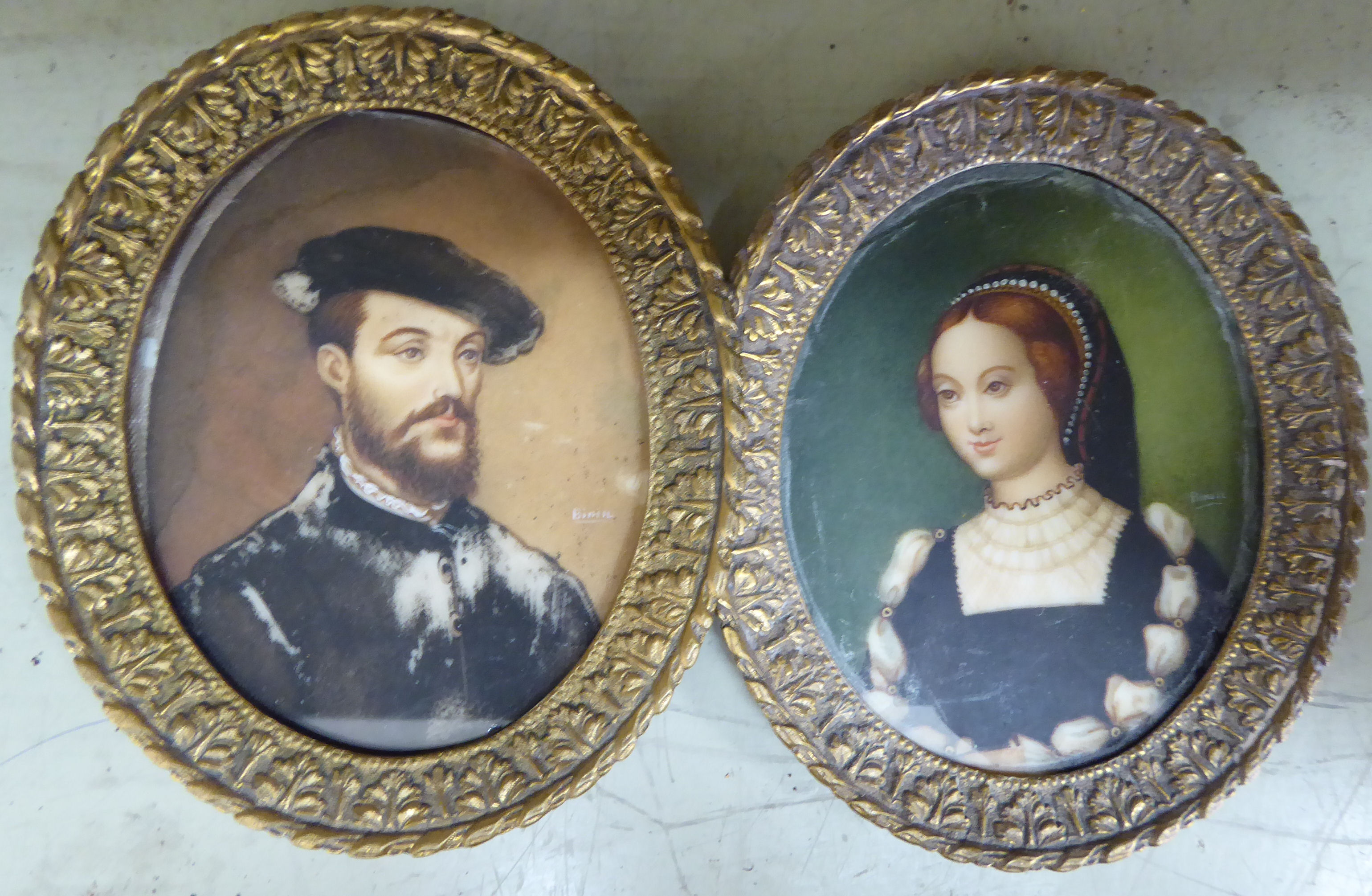 A pair of head and shoulders portrait miniatures,