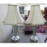 A pair of modern table lamps, the hexagonal tapered, multi-panelled, bevelled mirror sections,