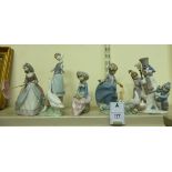 Five Lladro porcelain figures: to include two children building a snowman 9''h TO8