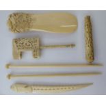 Early 20thC carved ivory collectables: to include a shoe horn;