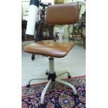 A 1950/60s grey painted, metal framed typist's chair with a brown faux hide back and seat,