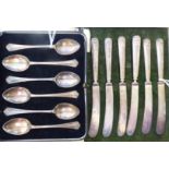 A set of six silver teaspoons with cast fan pattern terminals cased;