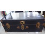 A mid 20thC pressed card and metal mounted trunk with metal clasps 13''h 32''w SL