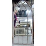 A modern Gothic inspired wrought metal framed mirror 46''h 20''w CA