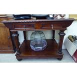 A modern mid Victorian style Howard & Son inspired mahogany two tier single drawer hall table,